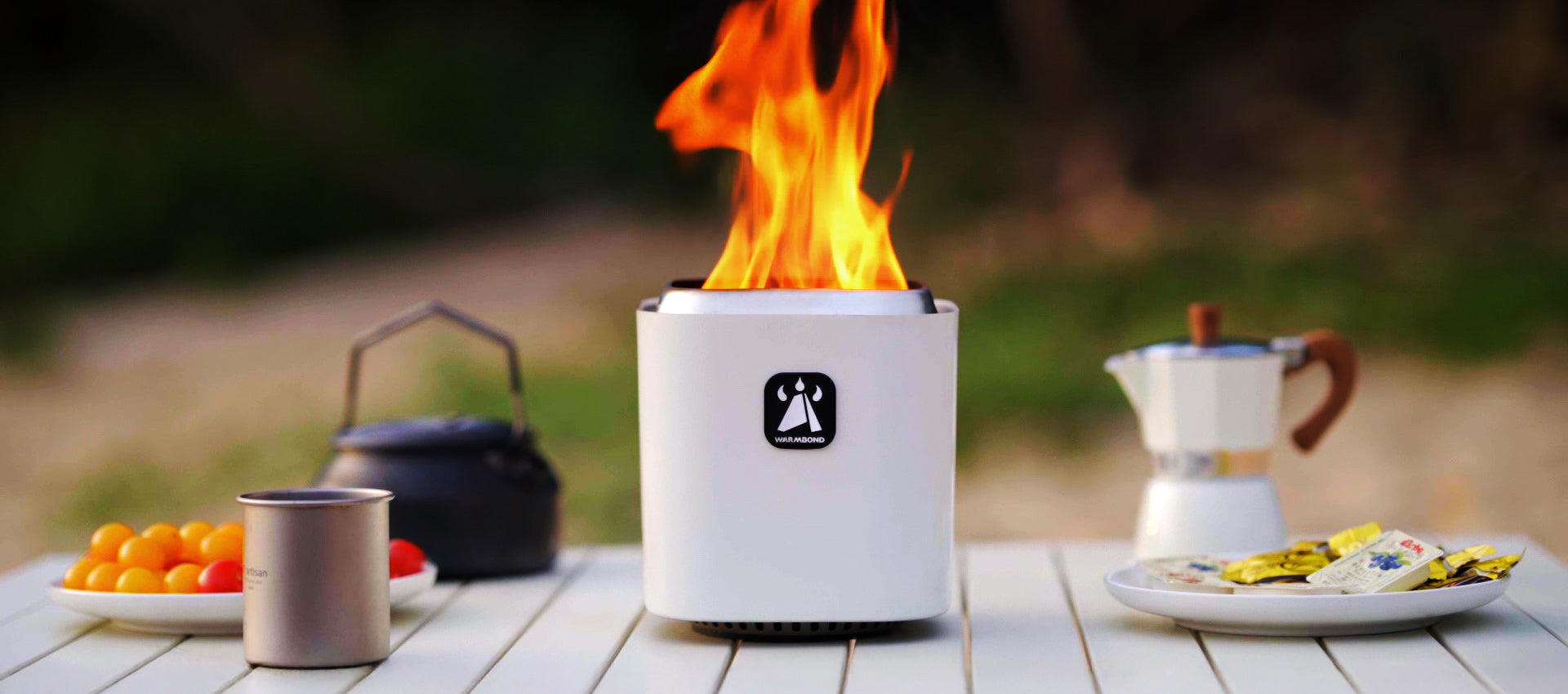 WARMBOND BondStove Mini portable smokeless fire pit in white generating clean flames for outdoor camping and patio use